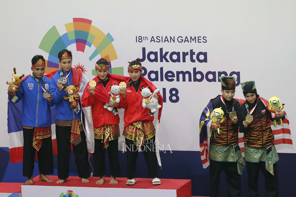 Pasangan Ayu/Ni Made berhak atas medali emas setelah meraih nilai tertinggi yaitu 574 diatas pasangan Thailand Saowanee/Oraya 564 dan Malaysia Nor Hamizah/Nur Syazreen 558. MI/Rommy Pujianto