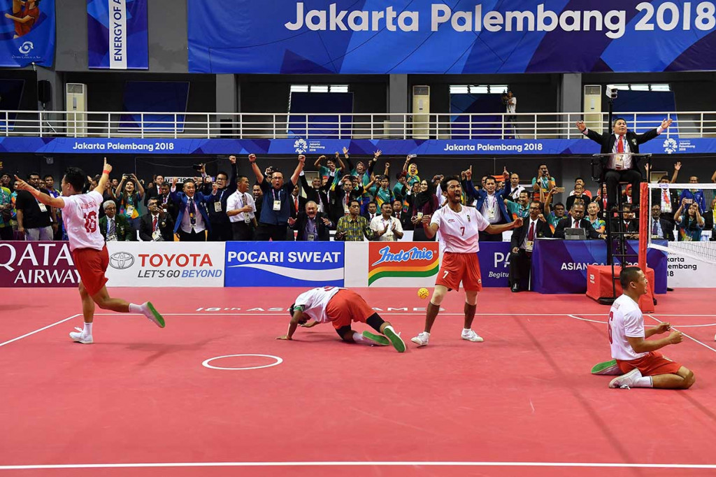 Ini merupakan medali emas pertama Indonesia dari cabang sepak takraw sejak pertama kali dilombakan di Asian Games pada 1990. AFP Photo/Mohd Rasfan