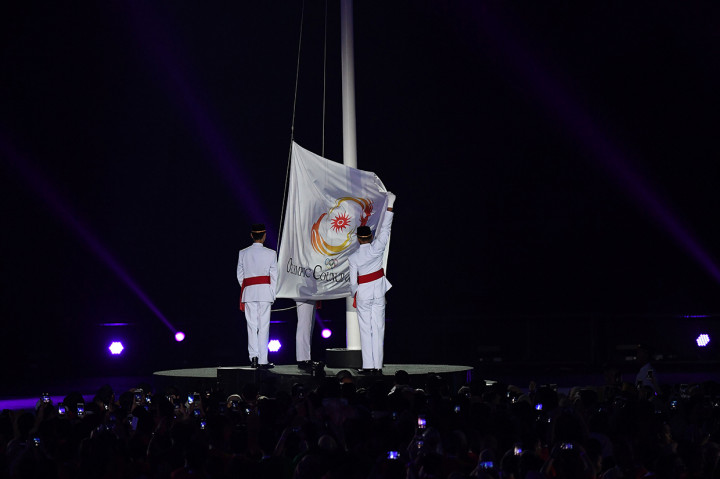 Acara puncak penutupan Asian Games 2018 akan dilakukan secara simbolis dengan penurunan bendera OCA. Afp Photo/Goh Chai Hin