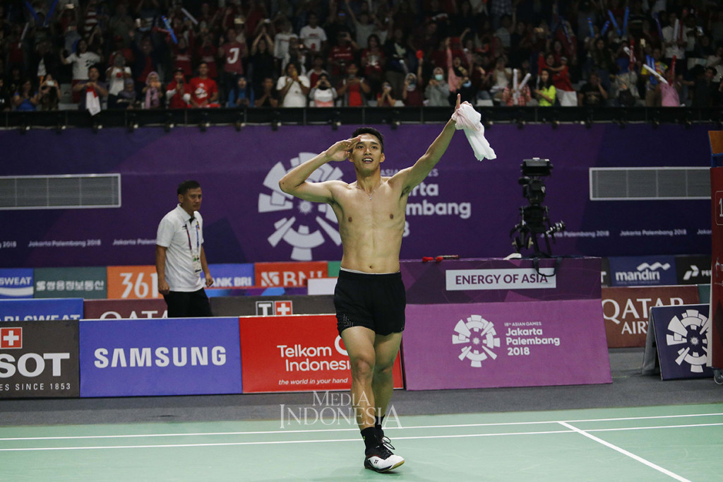 Ekspresi Jonatan Christie seusai mengalahkan pebulu tangkis Taiwan Tienchen Chou pada final bulu tangkis tunggal putra Asian Games 2018 di Istora Senayan, Komplek GBK, Jakarta, Selasa (28/8). MI/Rommy Pujianto
