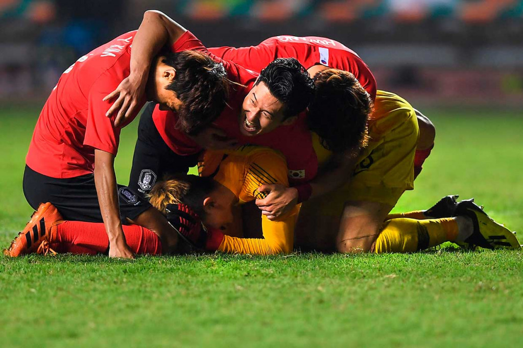 Gol pertama Korea diciptakan oleh Lee Seungwoo pada menit 93 dan kemudian digandakan oleh Hwang Hee Chan di menit 101. Sementara Jepang hanya menambah satu gol lewat sundulan Ayase Ueda di menit 115. AFP Photo/Chaideer Mahyuddin