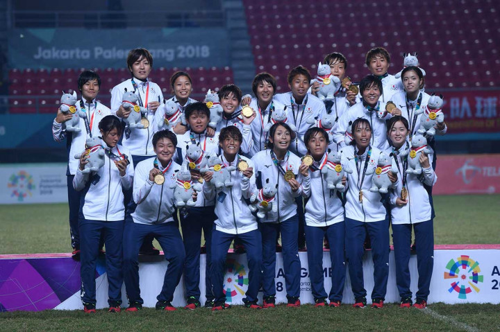Sementara di bagian putri, medali emas direbut oleh Jepang setelah mengalahkan Tiongkok 1-0. AFP Photo/Adek Berry