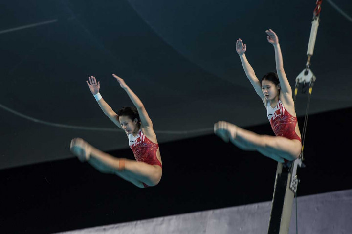 Atlet Tiongkok Zhang Minjie menjadi peraih medali emas termuda. Atlet loncat indah tersebut meraih emas pada nomor sinkronisasi saat berusia 14 tahun.  INASGOC/Antara Foto/Jurnasyanto Sukarno