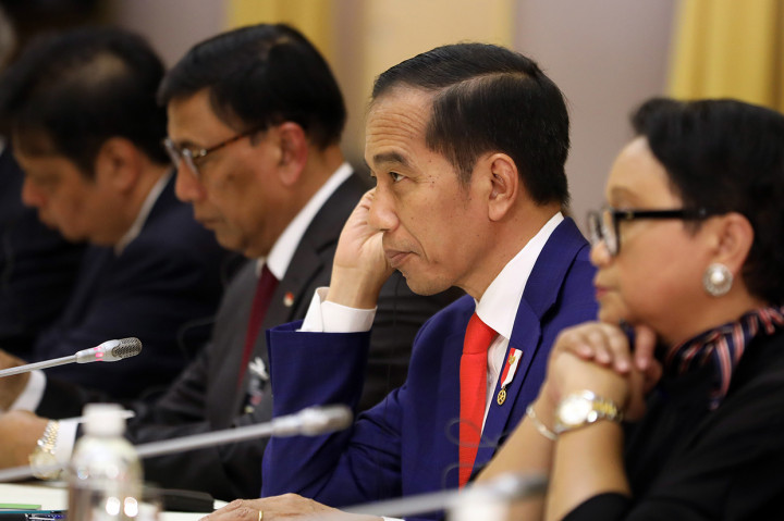 Dalam kunjungan kenegaraan ini, pemerintah Indonesia dan Vietnam menandatangani nota kesepahaman tentang Rencana Aksi Kemitraan Strategis Indonesia-Vietnam 2019-2023 untuk memberantas pencurian ikan ilegal di perairan masing-masing. Afp Photo/Pool/Luong Thai Linh