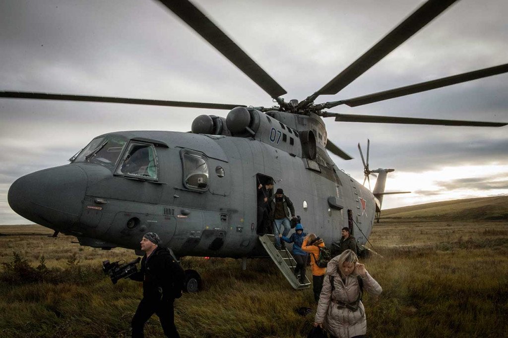 Puluhan wartawan asing bersiap meliput latihan militer Vostok-2018 di Siberia.