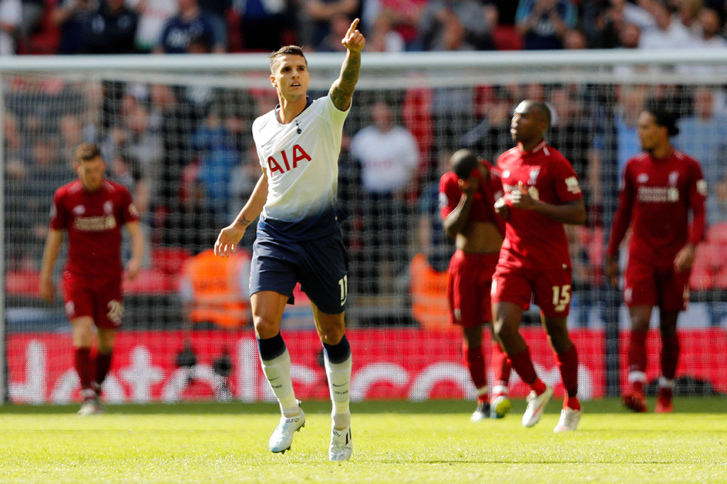 Di masa injury time, Spurs mencetak gol hiburan lewat Erik Lamela. Afp Photo/Adrian Dennis

