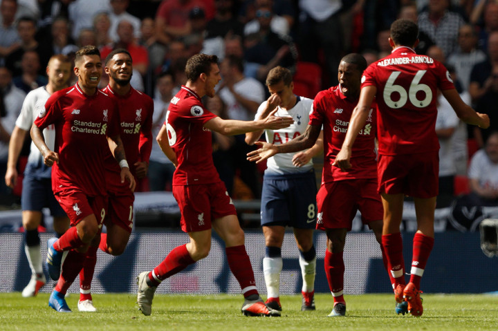 Tambahan tiga poin membuat Liverpool tetap di puncak klasemen dengan 15 poin dari lima laga. Sementara, Spurs punya delapan attempts dengan tiga on target. Afp Photo/Adrian Dennis