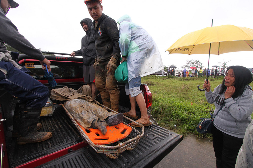 Pada Minggu (16/9) malam waktu setempat, kepolisian setempat melaporkan lonjakan jumlah korban tewas. Sejauh ini dipastikan 59 orang tewas di Filipina akibat terjangan topan Mangkhut. Afp Photo/JJ Landingin