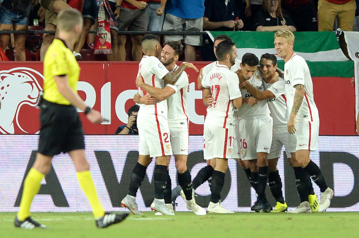 Tuan rumah Sevilla mengakhiri pesta kemenangan 3-0 setelah Wissam Ben Yedder menjebol gawang Real Madrid. Afp Photo/Cristina Quicler