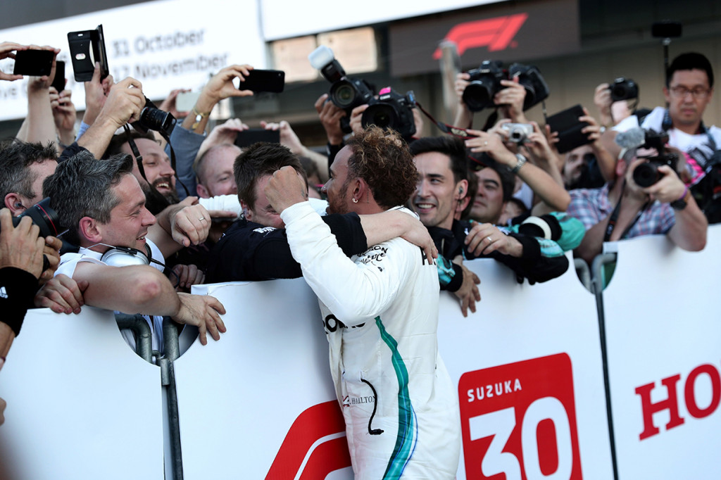 Pembalap Mercedes, Lewis Hamilton, tampil dominan saat menjuarai balapan F1 GP Jepang di Sirkuit Suzuka. Afp Photo/Behrouz Mehri