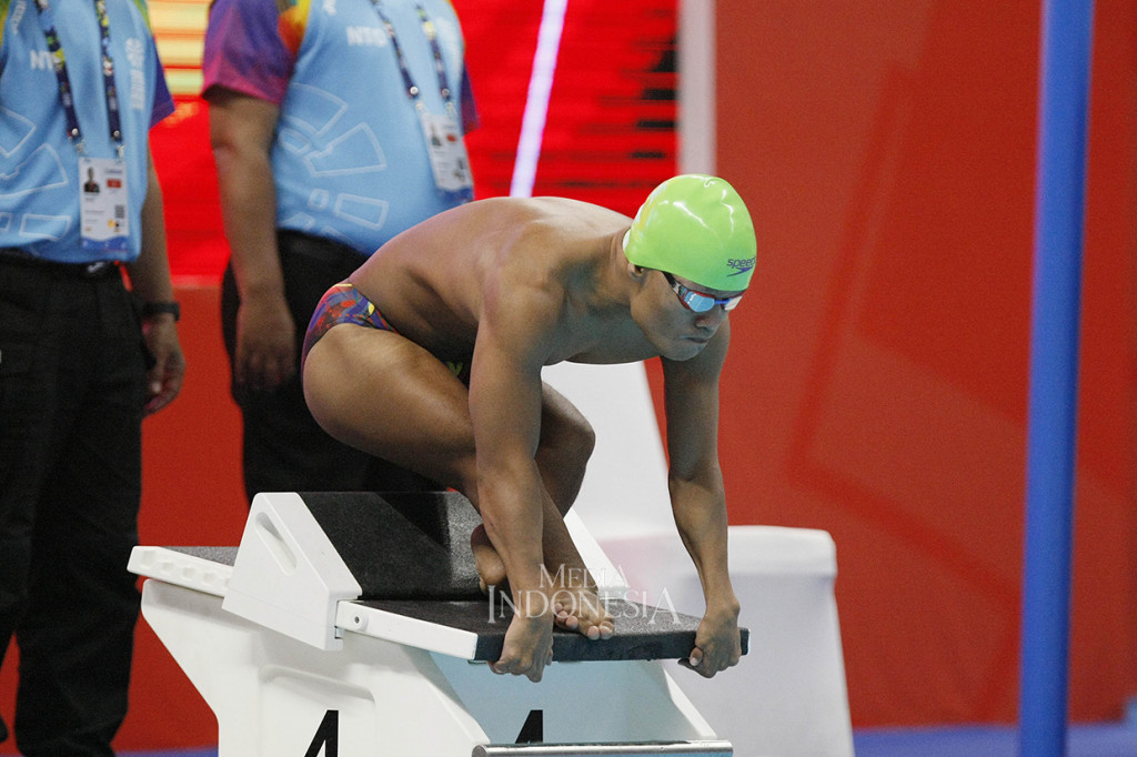 Turun pada nomor 100 meter gaya dada putra SB7 Asian Para Games, Aris membukukan waktu satu menit 34,52 detik.
