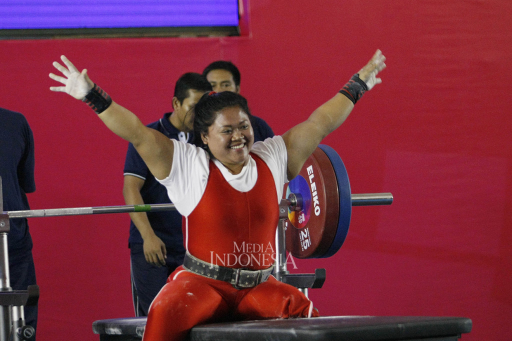 Sementara Siti Mahmudah merebut perak dari kelas 79 kg putri dengan total angkatan 120 kg.