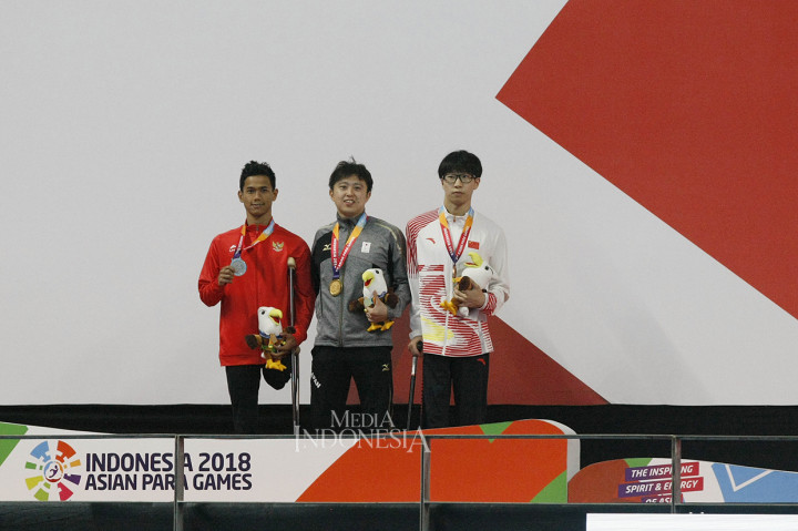 Emas diraih perenang Jepang Kubo Daiki 1 menit 5,40 detik dan perunggu oleh perenang Tiongkok Luo Qingquan 1 menit 7,24 detik.