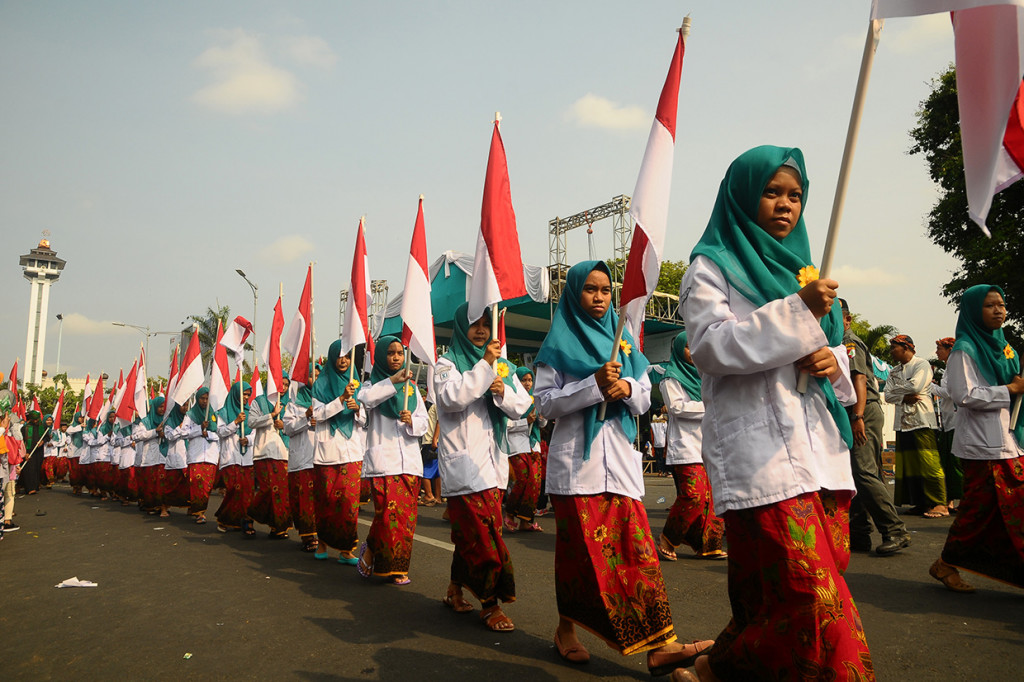 Santri mengikuti parade dalam rangkaian peringatan Hari Santri Nasional Tahun 2018 di Kudus, Jawa Tengah. Antara Foto/Yusuf Nugroho
