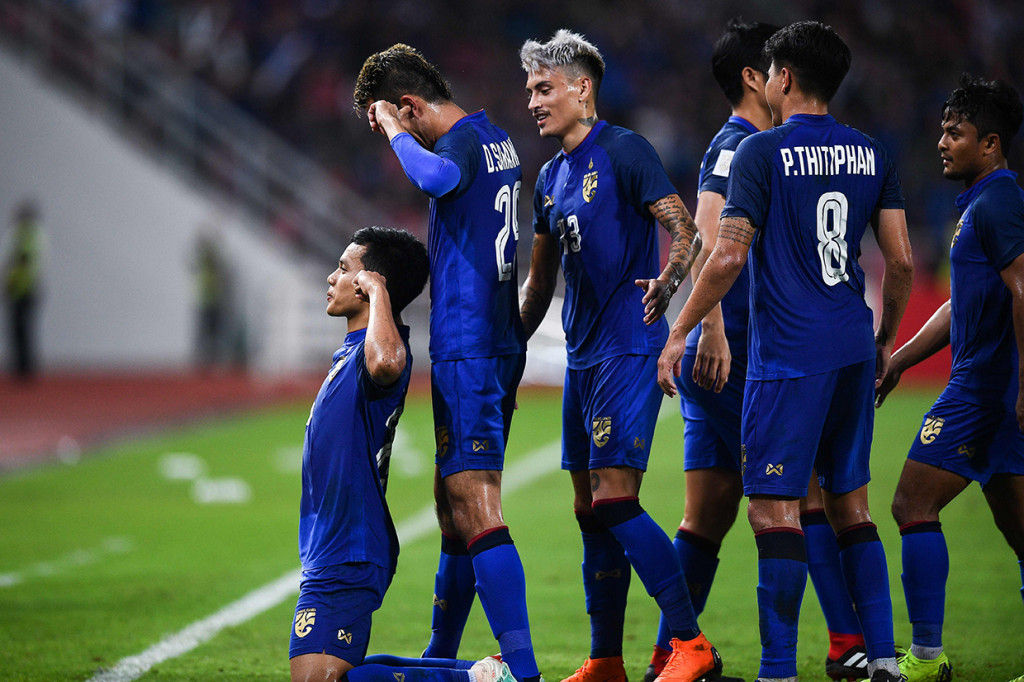 Sementara itu, empat gol Thailand dicetak Korrakot Wriya-Udomsin pada menit ke-38, Pansa Hemviboon (45+2'), Adisak Kraison (65'), dan Pokkhao Anan (74'). Afp Photo/Chalinee Thirasupa
