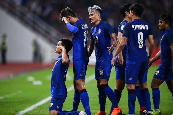 Sementara itu, empat gol Thailand dicetak Korrakot Wriya-Udomsin pada menit ke-38, Pansa Hemviboon (45+2'), Adisak Kraison (65'), dan Pokkhao Anan (74'). Afp Photo/Chalinee Thirasupa