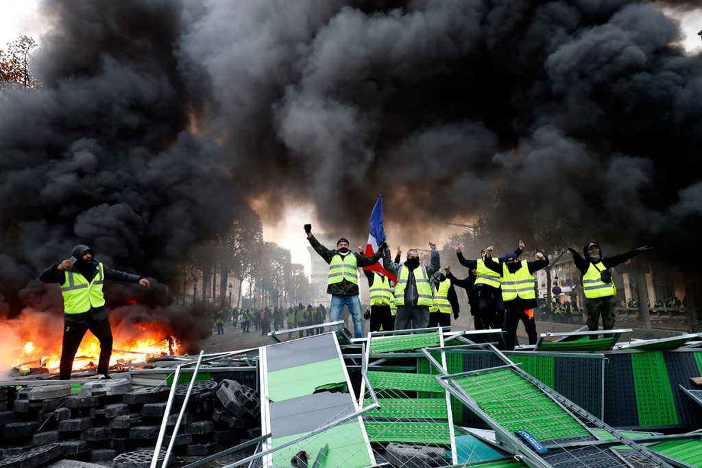 Sebanyak 130 orang di Paris dan di daerah lain di Prancis ditahan polisi terkait demo ini. Afp Photo/Francois Gulillot
