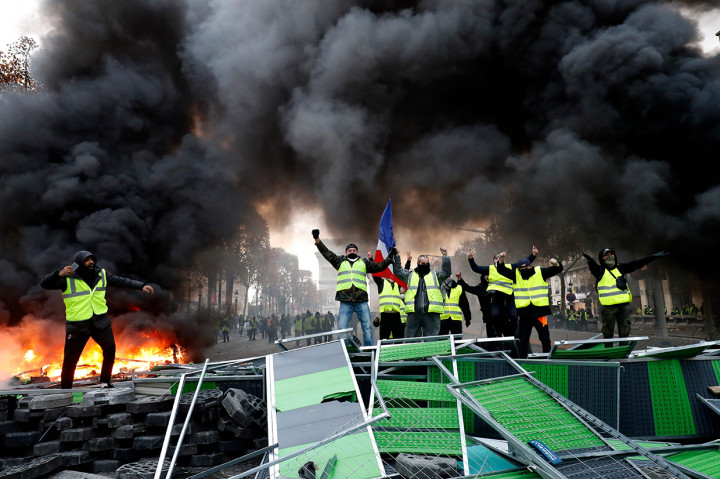 Sebanyak 130 orang di Paris dan di daerah lain di Prancis ditahan polisi terkait demo ini. Afp Photo/Francois Gulillot
