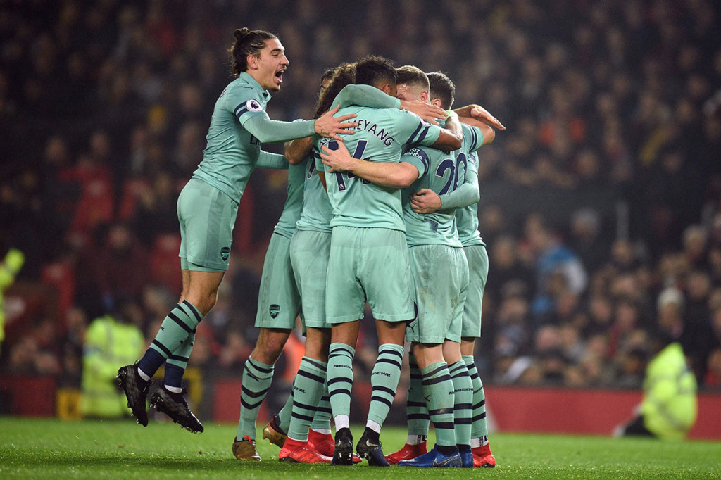 Para pemain Arsenal menyambut gembira gol pembuka tersebut.