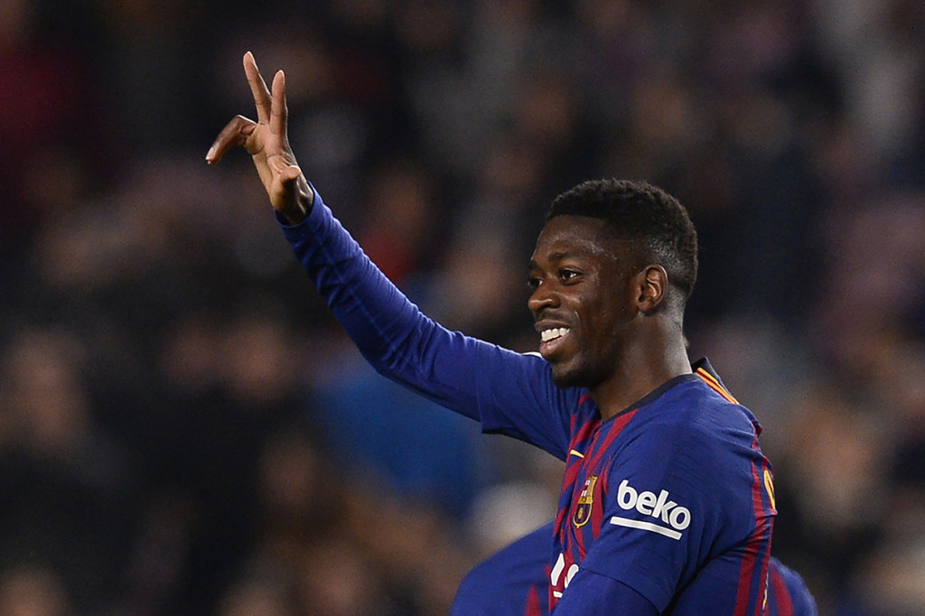 Ousmane Dembele melakukan selebrasi usai mencetak gol ke gawang Levante.
