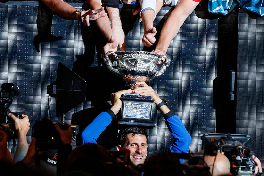 Ini jadi gelar grand slam ketiga beruntun untuk Djokovic. Sebelumnya ia berjaya di Wimbledon 2018 dan Amerika Serikat Terbuka 2018. Afp Photo/David Gray
