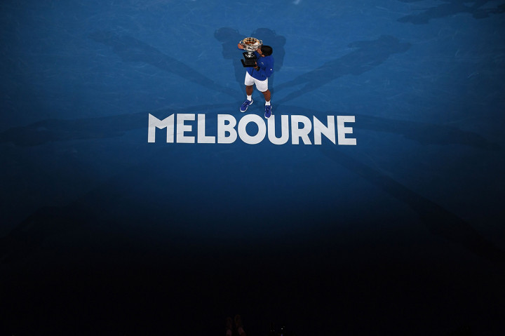 Djokovic kini sudah mengoleksi 15 gelar grand slam di sepanjang kariernya. Ia melewati catatan legenda tenis AS, Pete Sampras, yang punya 14 gelar grand slam. Afp Photo/William West
