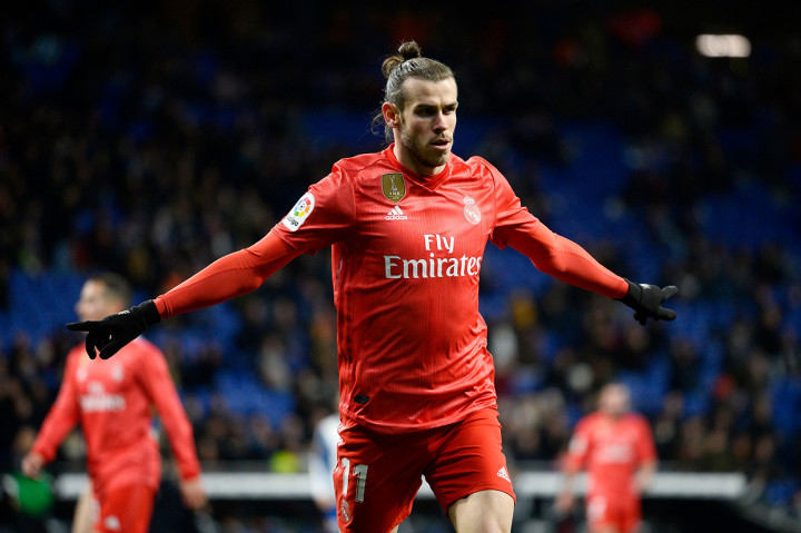 Pemain Real Madrid Gareth Bale merayakan gol usai menjebol gawang Espanyol dalam lanjutan La Liga di RCDE Stadium, Spanyol.