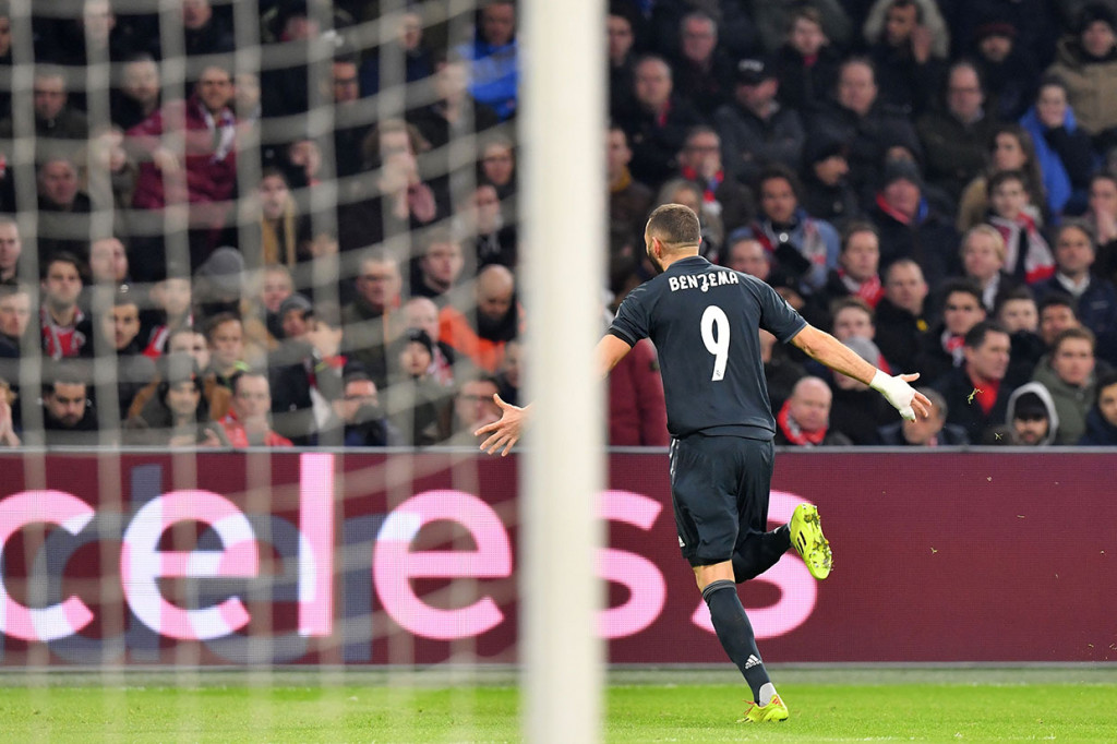 Benzema melakukan selebrasi usai menaklukkan kiper Ajax asal Kamerun Andre Onana.