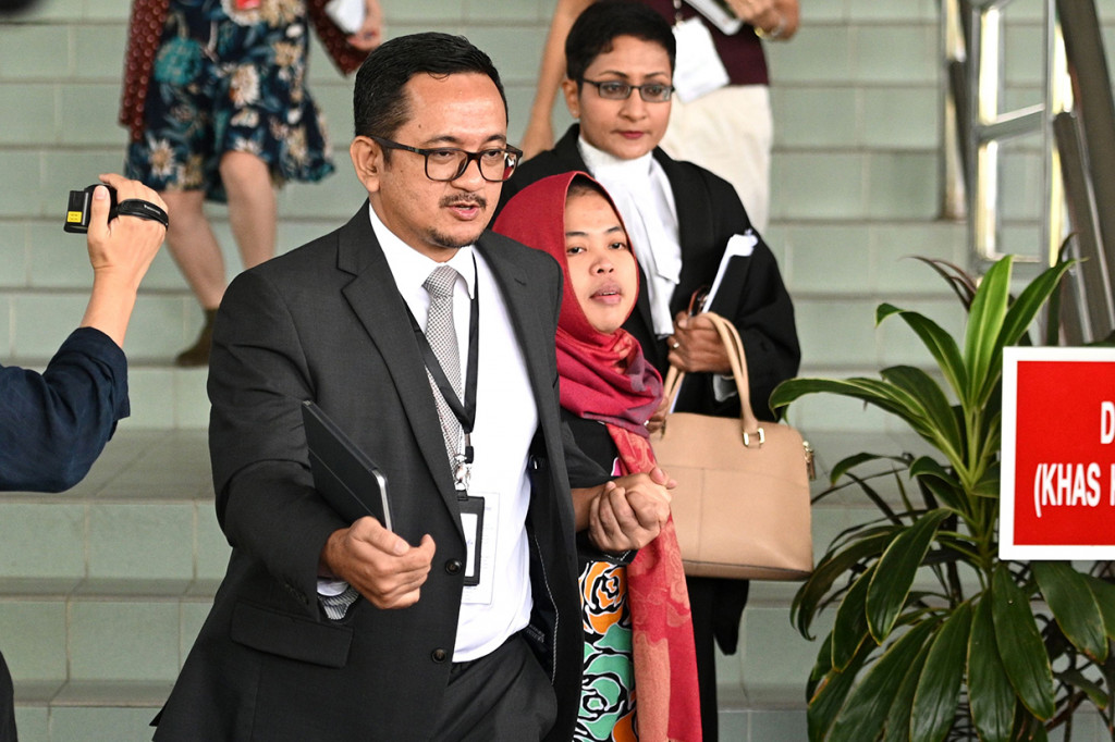 Siti Aisyah dibebaskan lewat kewenangan Jaksa Agung Malaysia berdasarkan Pasal 254 Kitab Hukum Acara Pidana Malaysia. Pemerintah sudah intens melakukan lobi hingga akhirnya dakwaan pembunuhan dicabut. Afp Photo/Mohd Rasfan