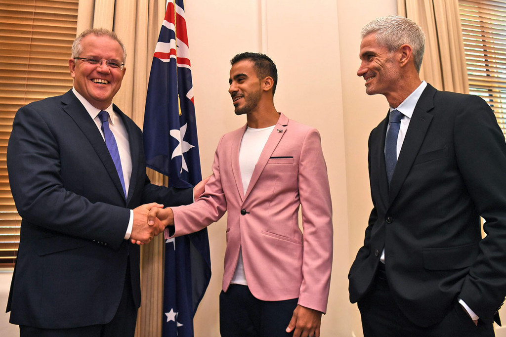 Pemain sepak bola 25 tahun itu menjadi tenar setelah ditangkap saat berbulan madu di Thailand tahun lalu. Dia dicari oleh Bahrain karena tuduhan pelanggaran yang terkait dengan pemberontakan Musim Semi Arab 2011.