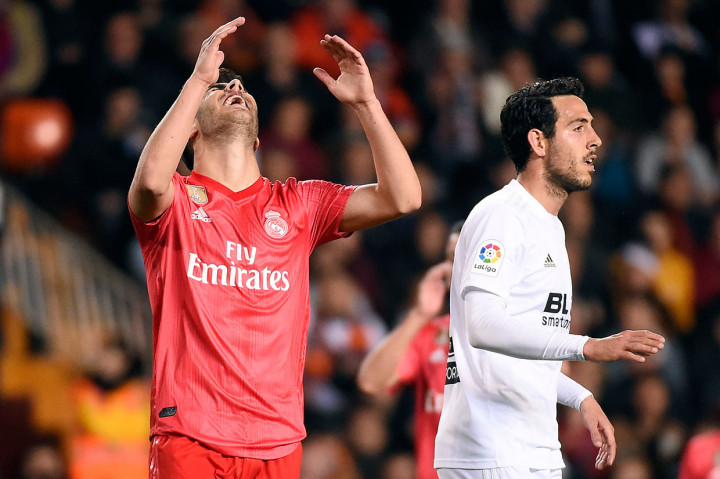 Gelandang Madrid Marco Asensio kecewa setelah tidak dapat memaksimalkan peluang yang dia dapat.