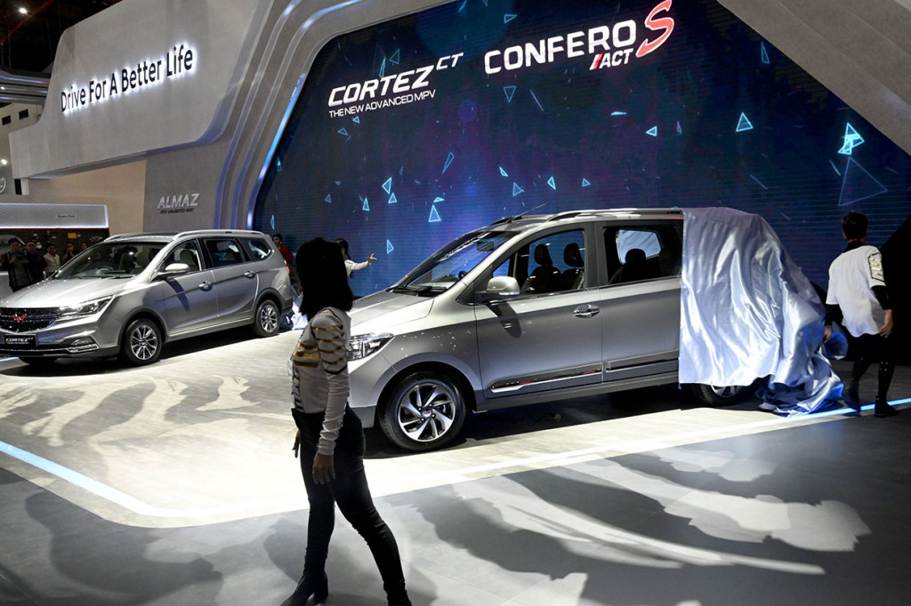 Wuling Motors mengumumkan harga jual kendaraan keluarga Cortez CT dan Confero S ACT di IIMS 2019. Cortez CT diniagakan mulai Rp232 juta hingga Rp282 juta, sedangkan Confero S ACT ditawarkan seharga Rp191,8 juta, yang seluruhnya dalam status on the road Jakarta. AFP Photo/Goh Cai Hin