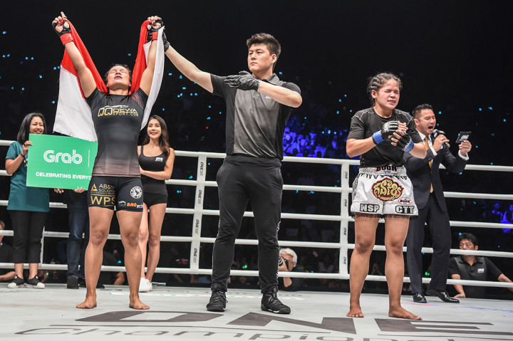 Sementara itu pertarungan kelas atom (atomweight) wanita, petarung tuan rumah Priscilla Hertati Lumban Gaol berhasil mengalahkan petarung asal Kamboja, Juara Dunia Kun Khmer, Nou Srey Pov.