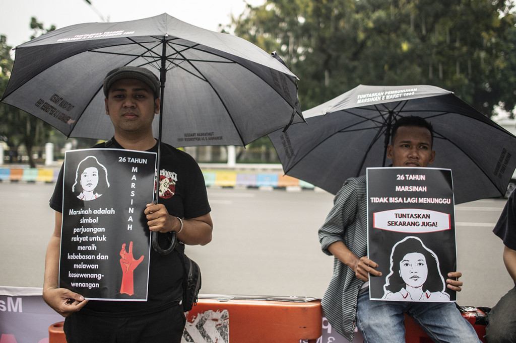 Aksi serupa digelar sejumlah aktivis di di depan Istana Merdeka, Jakarta. Antara Foto/Aprillio Akbar