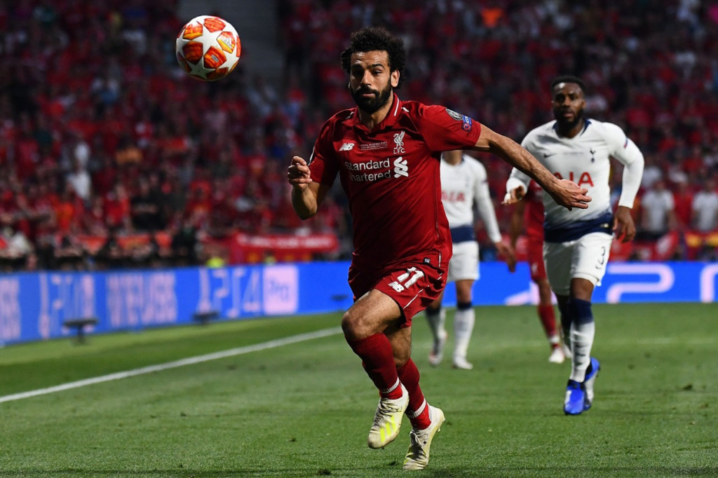 The Reds membuka keunggulan pada menit kedua ketika handball Moussa Sissoko membuat mereka mendapat penalti. Mohamed Salah mengeksekusi dengan sempurna ke gawang Hugo Lloris. Afp Photo/Gabriel Bouys