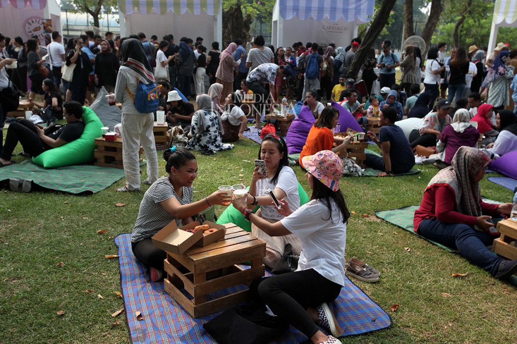 Suasana acara Semasa Piknik di Taman Lapangan Banteng, Jakarta Pusat.