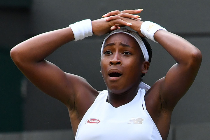 Ekspresi Cori Gauff antara gembira dan seakan tidak percaya setelah menundukkan juara lima kali Wimbledon, Venus Williams, pada laga hari pertama turnamen tersebut, Senin, 1 Juli 2019 waktu setempat.