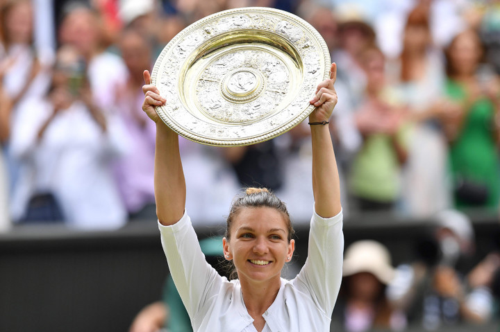 Ini adalah gelar Grand Slam kedua sepanjang karier Halep. Sebelumnya petenis berusia 27 tahun itu memenangkan Prancis Terbuka 2018. Afp Photo/Glyn Kirk