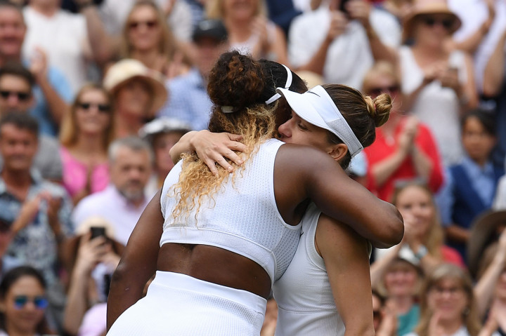 Halep yang jadi unggulan ketujuh dengan mudah menaklukkan Serena Williams dua set langsung, 6-2 dan 6-2. Afp Photo/Ben Stansall
