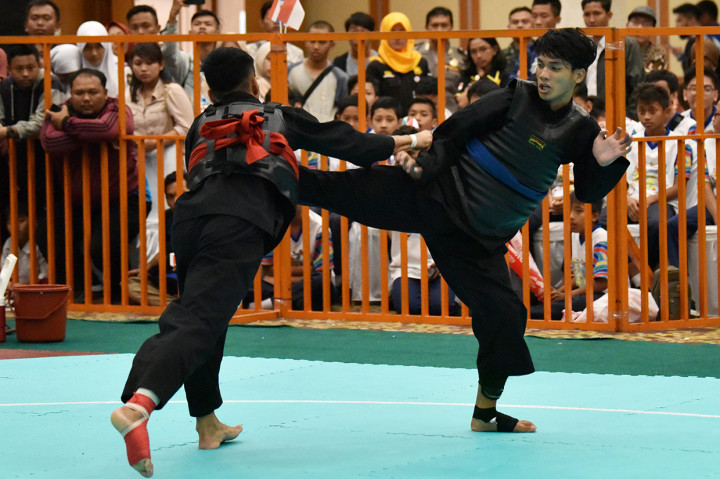 Pada pertandingan final Amirullah Karim mengalahkan pesilat putra Laos Feng Vongphakdy dengan skor 5-0. 