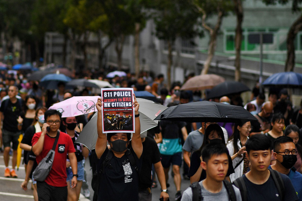 Polisi sebelumnya telah melarang pawai tetapi memberikan persetujuan pada menit-menit terakhir setelah perubahan rute, dari Taman Hoi Sham di To Kwa Wan ke stasiun MTR Whampoa. AFP Photo/Manan Vatsyayana
