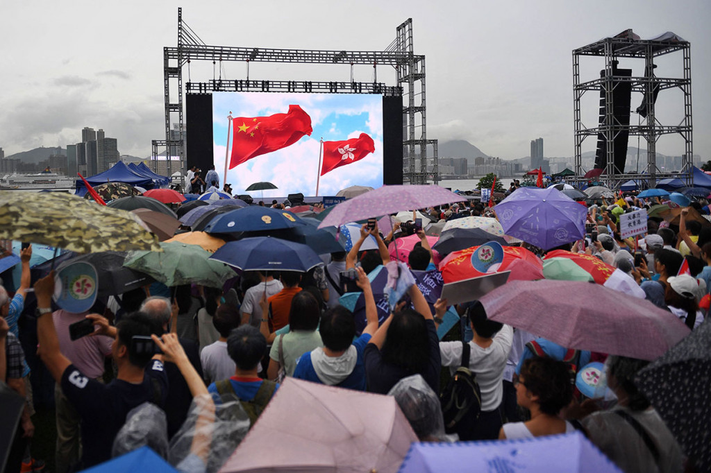 Ini merupakan unjuk rasa ketiga yang disetujui oleh Hong Kong pada hari Sabtu, yang terbaru dalam lebih dari dua bulan kerusuhan sipil yang dipicu oleh RUU ekstradisi yang sekarang ditangguhkan. AFP Photo/Lillian Suwanrumpha