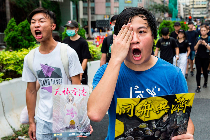 Gelombang protes di Hong Kong telah terjadi selama lebih dari dua bulan, yang awalnya dipicu Rancangan Undang-Undang Ekstradisi. Namun aksi protes terus bergulir hingga kini meski proses pengesahan RUU Ekstradisi telah dihentikan pemerintah Hong Kong. AFP Photo/Isaac Lawrence