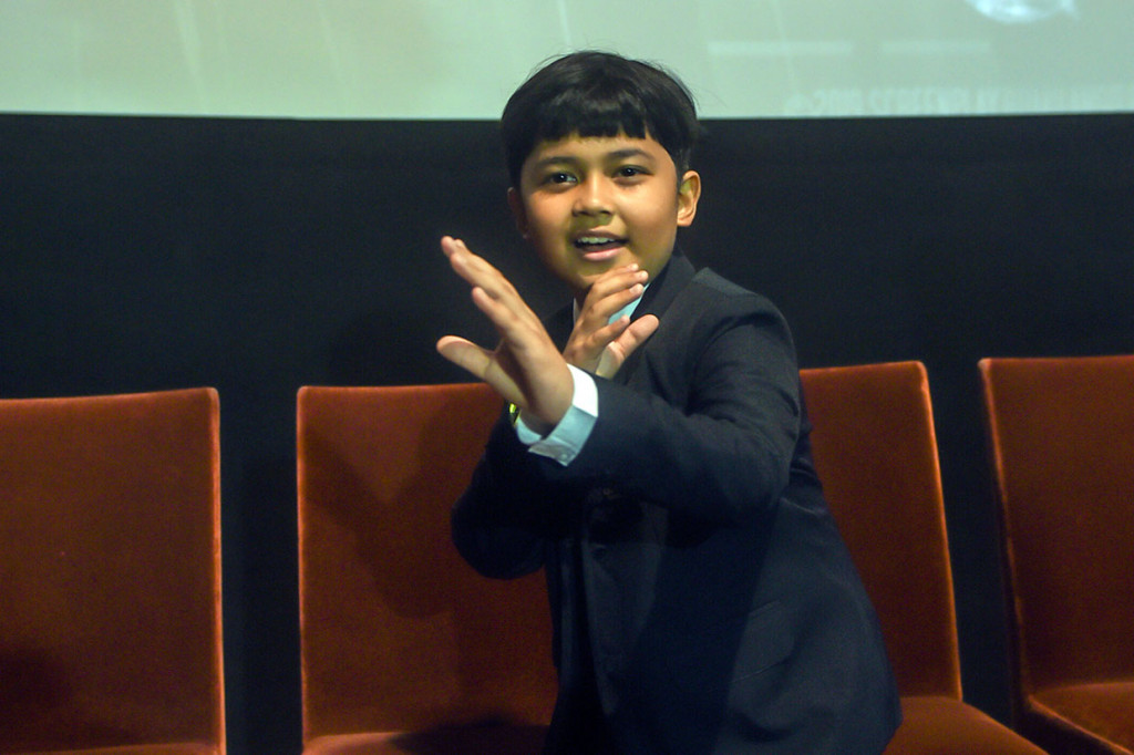 Pemeran Sancaka kecil, Muzakki Ramdhan berpose saat menghadiri acara peluncuran film Gundala.