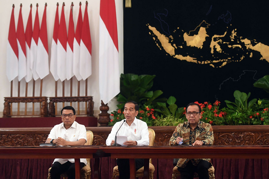Jokowi menyatakan tidak setuju dengan empat usulan DPR dalam revisi UU no 30 tahun 2002. 