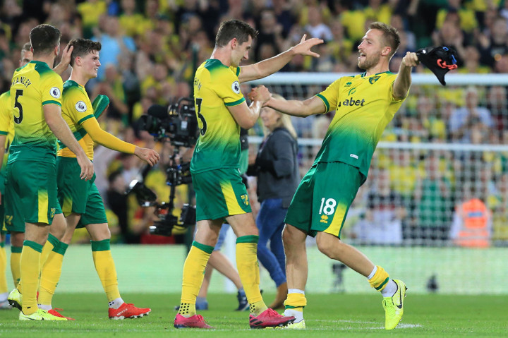 Kenny McLean melakukan selebrasi usai mencetak gol ke gawang Manchester City dalam laga pekan kelima Liga Inggris 2019-2020.

