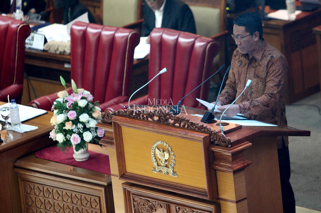 Ketua Badan Legislasi Supratman Andi Agtas membacakan hasil pembahasan revisi UU KPK dalam rapat paripurna DPR di Gedung Nusantara II, Kompleks Parlemen Senayan, Jakarta.