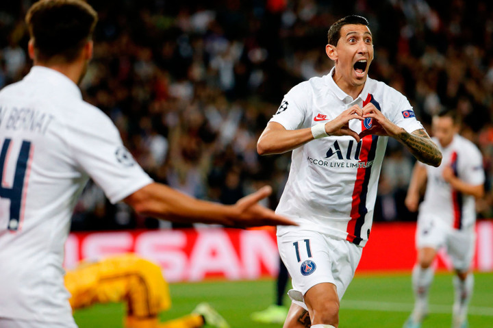 Di Maria melakukan selebrasi usai menaklukkan kiper Madrid Thibaut Courtois.