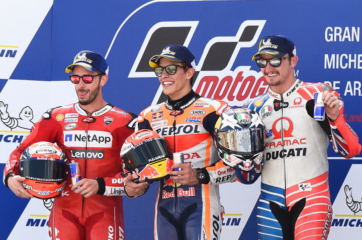 Pada balapan yang berlangsung dalam 23 putaran itu, Marquez sukses mengungguli Andrea Dovizioso (Mission Winnow Ducati) dan Jack Miller (Alma Pramac Racing). AFP Photo/Jose Jordan
