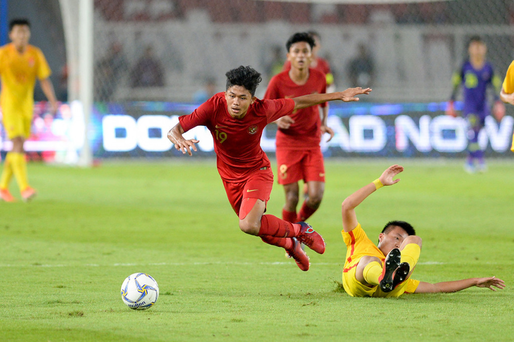 Timnas Indonesia dan timnas Tiongkok bermain agresif sejak peluit awal pertandingan. Antara Foto/M Risyal Hidayat